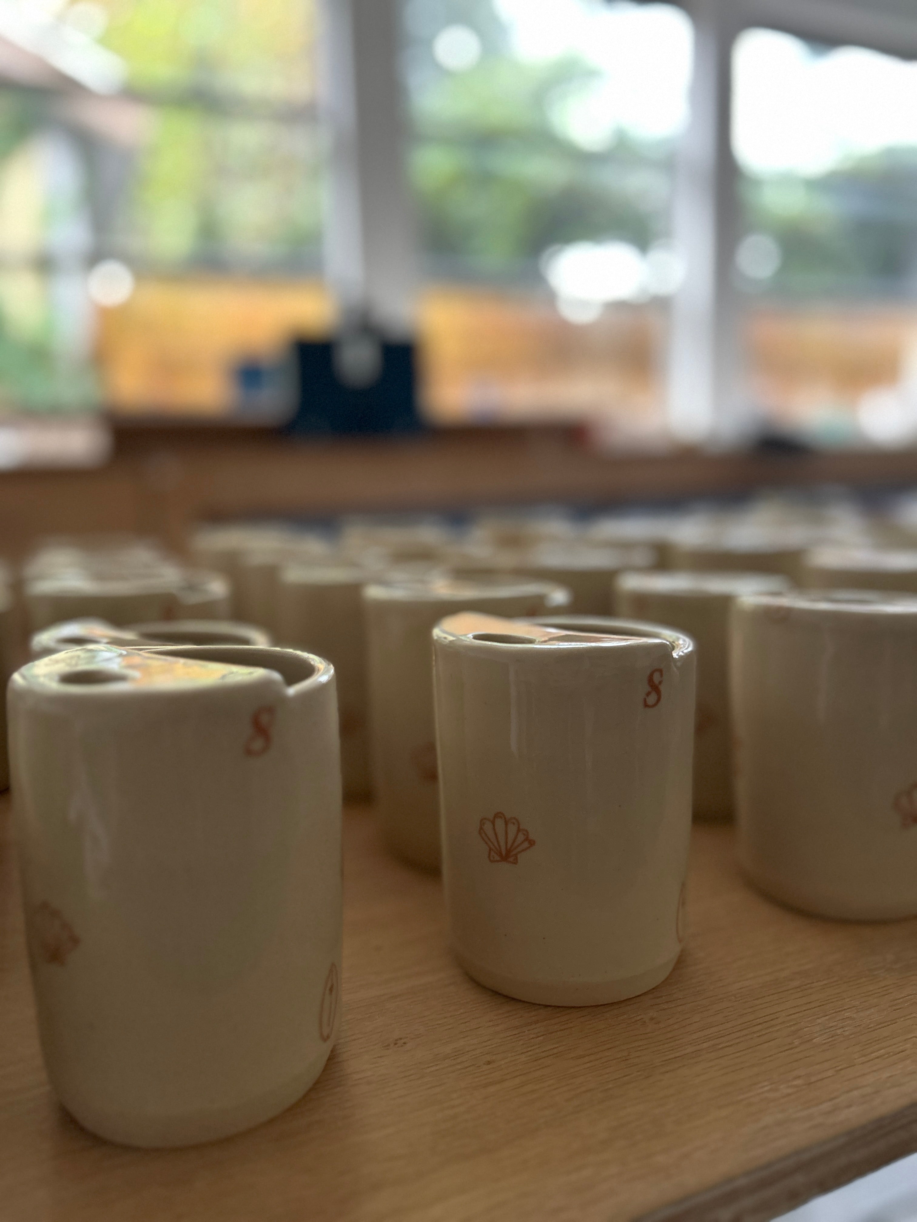 custom travel cup: black line drawings