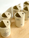 custom travel cup: black line drawings