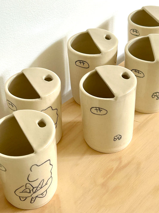 custom travel cup: black line drawings